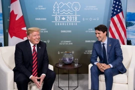 Thủ tướng Canada Justin Trudea hội đàm với Tổng thống Mỹ Donald Trump bên lề hội nghị G7. (Nguồn: AFP/TTXVN)