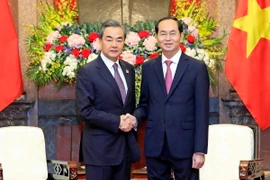 Chủ tịch nước Trần Đại Quang tiếp Ủy viên Quốc vụ, Bộ trưởng Bộ Ngoại giao Trung Quốc Vương Nghị. (Ảnh: Nhan Sáng/TTXVN)