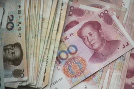 Đồng nhân dân tệ của Trung Quốc tại thủ đô Bắc Kinh. (Ảnh: AFP/TTXVN)