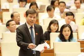 Viện trưởng Viện Kiểm sát nhân dân tối cao Lê Minh Trí trả lời chất vấn. (Ảnh: Phương Hoa/TTXVN)