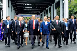 Chủ tịch nước Trần Đại Quang và các Trưởng đoàn tham dự hội nghị APEC. (Ảnh: TTXVN)