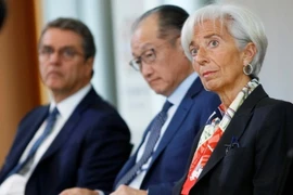 Tổng Giám đốc IMF Christine Lagarde, Chủ tịch Ngân hàng Thế giới Jim Yong Kim, và Tổng Giám đốc WTO Roberto Azevedo