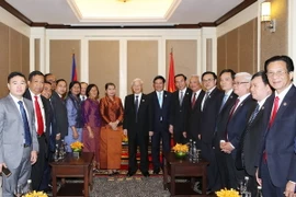 Tổng Bí thư Nguyễn Phú Trọng với các đại biểu. (Ảnh: Trí Dũng/TTXVN)