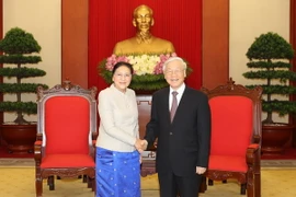 Tổng Bí thư Nguyễn Phú Trọng tiếp Chủ tịch Quốc hội Lào Pany Yathotou. (Ảnh: Trí Dũng/TTXVN)