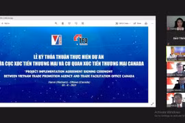 Lễ ký kết được tổ chức dưới hình thức trực tuyến, có sự tham gia của Thương vụ Việt Nam tại Canada và Đại sứ quán Canada tại Việt Nam. (Ảnh: Vũ Quang Thịnh/TTXVN)