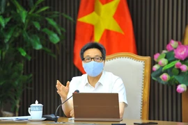 Phó Thủ tướng Chính phủ Vũ Đức Đam, Trưởng Ban Chỉ đạo Quốc gia phòng, chống dịch COVID-19 chủ trì cuộc họp. (Ảnh: Minh Đức/TTXVN) 
