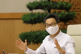 Phó Thủ tướng Vũ Đức Đam chủ trì cuộc họp. (Ảnh: Nguyễn Điệp/TTXVN)