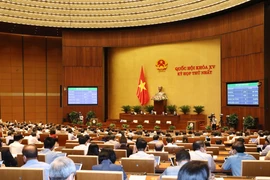 Quốc hội biểu quyết thông qua Nghị quyết về cơ cấu tổ chức của Chính phủ nhiệm kỳ 2021-2026. (Ảnh: Phương Hoa/TTXVN) 