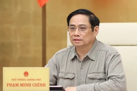Thủ tướng Phạm Minh Chính chủ trì cuộc họp Ban Chỉ đạo Quốc gia phòng, chống dịch COVID-19. (Ảnh: Dương Giang/TTXVN) 