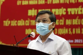 Ông Lê Minh Trí, Viện trưởng Viện Kiểm sát nhân dân Tối cao, ứng cử đại biểu Quốc hội khóa XV trình bày chương trình hành động trong Hội nghị tiếp xúc cử tri, vận động tranh cử tại Đơn vị bầu cử số 3, được tổ chức trực tuyến tại Quận 8 ngày 13/5. (Ảnh: Xu