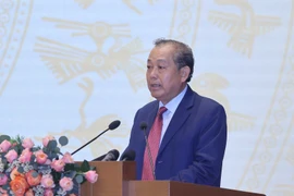 Phó Thủ tướng Thường trực Trương Hoà Bình phát biểu khai mạc. (Ảnh: Thống Nhất/TTXVN)