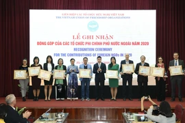 Liên hiệp các tổ chức hữu nghị Việt Nam tổ chức lễ ghi nhận đóng góp của các tổ chức phi chính phủ nước ngoài, chiều 21/12/2020, tại Hà Nội. (Ảnh: Văn Điệp/TTXVN) 