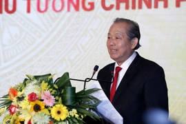 Phó Thủ tướng Thường trực Chính phủ Trương Hòa Binh phát biểu tại lễ kỷ niệm. (Ảnh: Dương Giang/TTXVN)