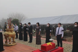 Toàn cảnh lễ viếng, truy điệu, an táng liệt sỹ tại Nghĩa trang Liệt sỹ tỉnh Bình Phước. (Ảnh: K GỬIH/TTXVN) 