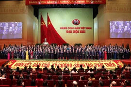 Ban Chấp hành Trung ương Đảng khóa XIII ra mắt Đại hội. (Ảnh: TTXVN)