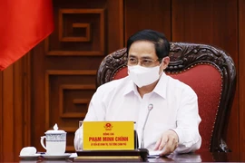 Thủ tướng Phạm Minh Chính chủ trì cuộc họp Thường trực Chính phủ chiều 17/5. (Ảnh: Dương Giang/TTXVN) 