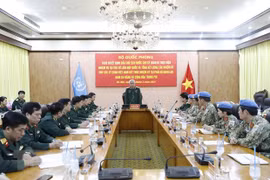 Thượng tướng Nguyễn Chí Vịnh, Thứ trưởng Bộ Quốc phòng phát biểu tại lễ trao quyết định của Chủ tịch nước cho sỹ quan đi thực hiện nhiệm vụ tại Trụ sở Liên hợp quốc. (Ảnh: Dương Giang/TTXVN
