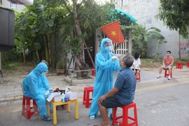 Xét nghiệm COVID-19. (Nguồn: TTXVN)