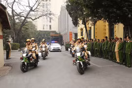 Các lực lượng ra quân thực hiện phương án bảo đảm an ninh, trật tự Đại hội đại biểu toàn quốc lần thứ XIII của Đảng. (Ảnh: Doãn Tấn/TTXVN)