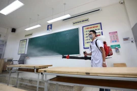 Các điểm thi đều được phun khử khuẩn để phòng, chống dịch. (Ảnh: Thanh Tùng/TTXVN) 