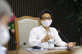 Phó Thủ tướng Vũ Đức Đam chủ trì cuộc họp. (Ảnh: Văn Điệp/TTXVN) 