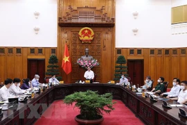 Ban Chỉ đạo Quốc gia phòng, chống dịch COVID-19 họp chiều 25/8. (Ảnh: Dương Giang/TTXVN) 