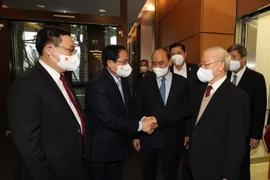 Tổng Bí thư Nguyễn Phú Trọng cùng các đồng chí lãnh đạo Đảng, Nhà nước dự hội nghị. (Ảnh: Trí Dũng/TTXVN)