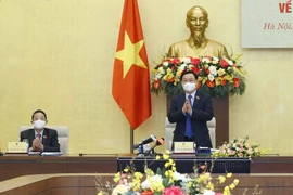 Chủ tịch Quốc hội Vương Đình Huệ chủ trì tọa đàm. (Ảnh: Doãn Tấn/TTXVN)