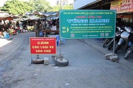 Chốt kiểm soát vùng xanh tại chợ Thanh Sơn (phường Thanh Sơn, thành phố Phan Rang-Tháp Chàm). (Ảnh: Nguyễn Thành/TTXVN)