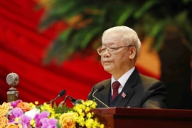 Đồng chí Nguyễn Phú Trọng, Tổng Bí thư Ban Chấp hành Trung ương Đảng, Chủ tịch nước CHXHCN Việt Nam đọc Báo cáo chính trị của Ban Chấp hành Trung ương Đảng khóa XII và các văn kiện trình Đại hội. (Ảnh: TTXVN)