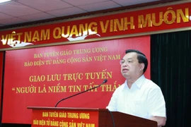 Phó Trưởng Ban Tuyên giáo Trung ương Lê Mạnh Hùng phát biểu khai mạc buổi giao lưu. (Ảnh: Phương Hoa/TTXVN) 