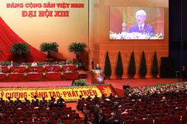 Đại hội nghe Tổng Bí thư Ban Chấp hành Trung ương Đảng, Chủ tịch nước CHXHCN Việt Nam Nguyễn Phú Trọng đọc Báo cáo chính trị của Ban Chấp hành Trung ương Đảng khóa XII và các văn kiện trình Đại hội. (Ảnh: TTXVN)