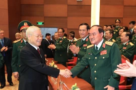 Tổng Bí thư Nguyễn Phú Trọng với các đại biểu tham dự Lễ kỷ niệm. (Ảnh: Trọng Đức/TTXVN)