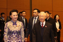 Tổng Bí thư, Chủ tịch nước Nguyễn Phú Trọng và Chủ tịch Quốc hội Nguyễn Thị Kim Ngân dự khai mạc Kỳ họp thứ 11, Quốc hội khóa XIV. (Ảnh: Trí Dũng/TTXVN)