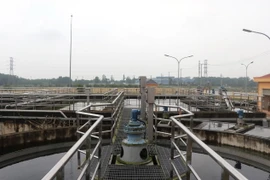 Bể chứa và các thiết bị Dự án Hệ thống xử lý nước thải Khu công nghiệp Quán Ngang đã cơ bản hoàn thành nhưng chưa thể vận hành. (Ảnh: Nguyên Lý/TTXVN)