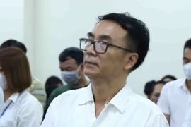 Bị cáo Trần Hùng, cựu Phó Cục trưởng Cục Quản lý thị trường (Bộ Công Thương) tại phiên tòa sơ thẩm. (Ảnh: Phạm Kiên/TTXVN)