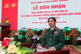 Đại tướng Phan Văn Giang, Ủy viên Bộ Chính trị, Bộ trưởng Bộ Quốc phòng phát biểu tại lễ kỷ niệm. (Ảnh: Trọng Đức/TTXVN)