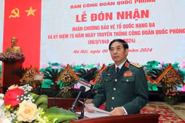 Đại tướng Phan Văn Giang, Ủy viên Bộ Chính trị, Bộ trưởng Bộ Quốc phòng phát biểu tại lễ kỷ niệm. (Ảnh: Trọng Đức/TTXVN)