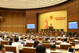Quốc hội sẽ biểu quyết thông qua một số Luật, Nghị quyết quan trọng trong tuần làm việc cuối cùng. (Ảnh: Phương Hoa/TTXVN)