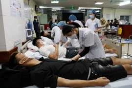 Đến sáng 6/4, sức khỏe của 92 công nhân Công ty TNHH sản xuất giày Chung Jye nghi bị ngộ độc thực phẩm đã cơ bản ổn định. (Ảnh minh họa: Thái Hùng/TTXVN)
