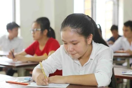 Thí sinh dự thi môn Lịch sử. (Ảnh: Quý Trung/TTXVN)