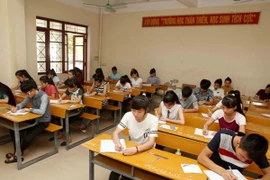 Thí sinh dự thi môn Lịch sử. (Ảnh: Quý Trung/TTXVN)