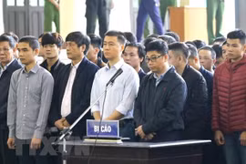 Các bị cáo tại phiên xét xử sơ thẩm. (Ảnh: Trung Kiên/TTXVN)