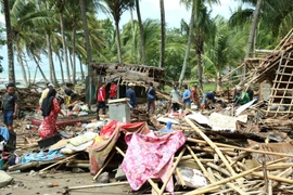 Một trận động đất ngoài khơi dẫn đến sóng thần tàn phá khu dân cư ven bờ biển Banten, Trung Java, Indonesia tháng 12/2018. (Ảnh: Đỗ Quyên/Vietnam+
