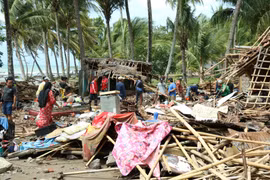 Một trận động đất ngoài khơi dẫn đến sóng thần tàn phá khu dân cư ven bờ biển Banten, Trung Java, Indonesia tháng 12/2018. (Ảnh: Đỗ Quyên/Vietnam+