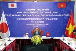 Đại tướng Tô Lâm, Bộ trưởng Bộ Công an Việt Nam hội đàm với Bộ trưởng, Chủ tịch Ủy ban Công an Quốc gia Nhật Bản Tanahashi Yasufumi theo hình thức trực tuyến. (Ảnh: TTXVN phát)