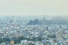  Vụ cháy nhìn từ trên cao. (Ảnh: Quốc Tuấn/TTXVN)