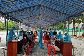 Khu vực triển khai tiêm vaccine Vero Cell tại xã Phú An, thị xã Bến Cát, tỉnh Bình Dương. (Ảnh: TTXVN)