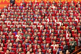 Các đại biểu dự phiên khai mạc Đại hội. (Ảnh: TTXVN)