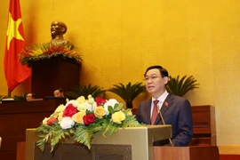 Chủ tịch Quốc hội Vương Đình Huệ đọc Tờ trình Danh sách đề cử để Quốc hội bầu Chủ tịch nước. (Ảnh: Văn Điệp/TTXVN)